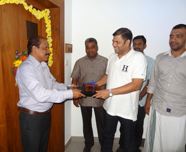 Keys being handed over to Mr Abdul Latheef of apartment no.B 13 