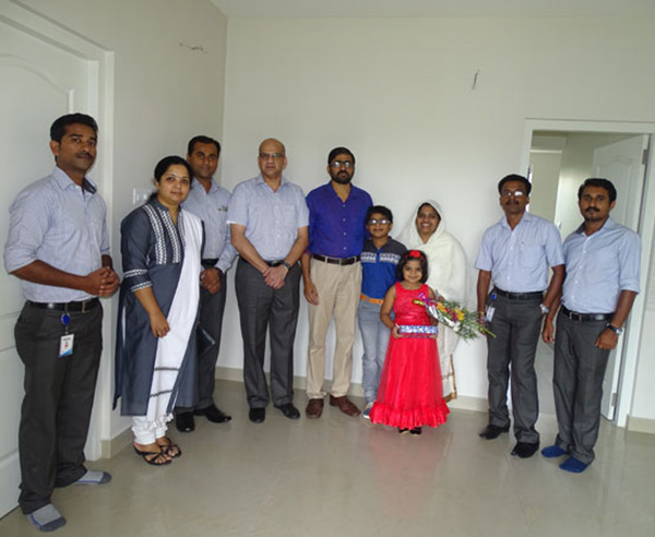 Our team with Mr. Abdul Rajib & family of apartment C 5 in Crescent Aster after handing over.