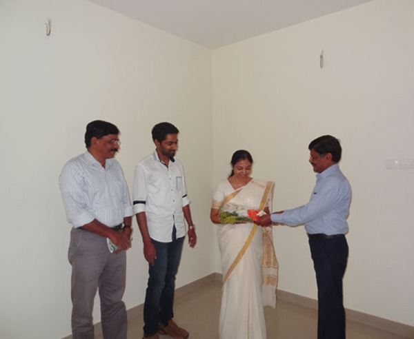 Our G M Projects greeting Ms.Preethy of apartment C 3,Crescent Iris during handing over ceremony.